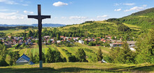 Three Christian Wooden Crosses In Front Of A Village In The Natural Landscape In The Foothills Of The High Tatras In The North Of Slovakia