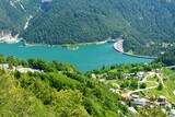 Fototapeta  - View of Lago di Cadore lake and Pieve di Cadore dam and the village of Sottocastello in Veneto region and Belluno province in Italy