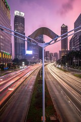 Sticker - Beautiful shot of a street with skyscrapers during a pink sunset