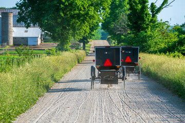 Sticker - Two Amish Buggies on rural, gravel road