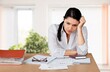 © BillionPhotos.com - Tired business woman feeling headache, due to overload with paperwork,. Sad office employee