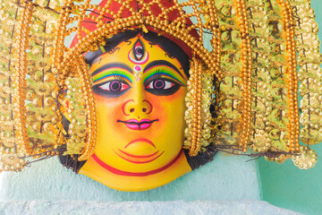 Wall Mural - Purulia, West Bengal, India - August 15th 2017 : Colorful Chhau (or chhou) masks of Goddess Durga, handicrafts on display for sale. Chhou is a tribal dance in India.