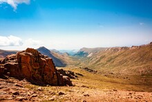 Scenic View Of A Landscape Of Rocky Desert Under A Blue Sky On A Sunny Day