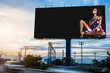 © totojang1977 - Beautiful and sexy Asian lady in white bra lingerie and The United States of America flag advertise on billboard blank for outdoor advertising poster or blank billboard for advertisement.