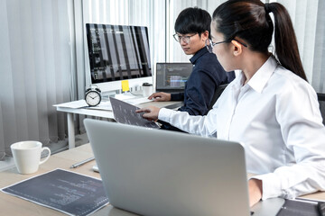 Wall Mural - team of two professional programmers working on website projects in software development on the desk