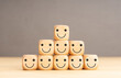 © Formatoriginal - Excellent business service rating customer experience. Wooden block shape with icon face smiley