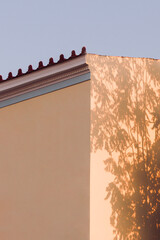 Wall Mural - Shadowplay on a athenian building, Athens, Greece