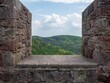 canvas print picture - blick durch eine Burgmauer auf die Eifel.