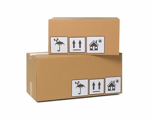 Canvas Print - Two closed cardboard boxes with packaging symbols isolated on white. Delivery service