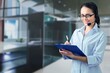 © BillionPhotos.com - Operator of hot line. Portrait of friendly customer service representative wearing headset in call center