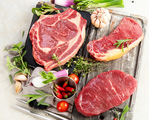 Wall Mural - Variety of raw beef meat steaks for grilling.