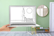 © Pixel-Shot - Designer holding laptop with drawing of new hallway interior with clothes rack