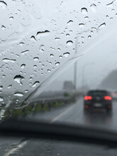 Looking Through The Window Of A Moving Car In The Rain