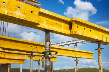 Formwork for pouring the second floor of a monolithic building. Reinforcement of walls and ceiling. Monolithic work during the construction of a building close-up. Construction technologies.