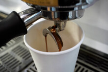 Close Up Of A Takeaway Coffee Being Extracted From A Coffee Machine