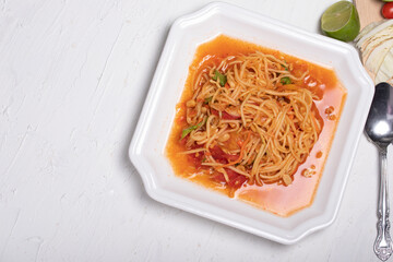 Poster - Thai papaya salad in a white plate Popular dishes on a white background