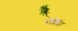 Leinwandbild Motiv Beach chairs under a palm tree on yellow background. Creative summer travel concept idea 3D Render 3D illustration