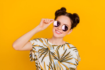 Wall Mural - Photo of funny adorable woman wear print t-shirt arms dark spectacles isolated yellow color background