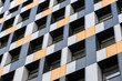 © SFotoz - Facade of a house with windows and colorful tiles