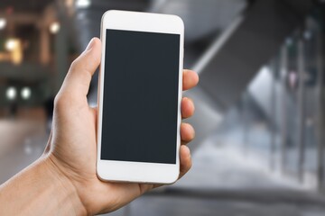 Sticker - Businessman Holding Smartphone with a blank screen, using Internet with Mobile Phone Device.