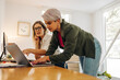 © Jacob Lund - Two young businesswomen working together in a creative office