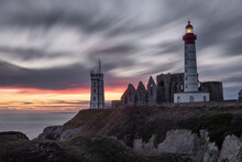 Sunset Long Esposure At Saint Mathieu Lighthouse With Some Ancient Ruins Below, Finistere, Brittany, France