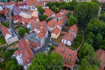 aerial view of the historic center of erfurt old city from above with old houses , bridge and church