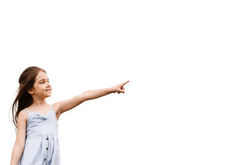 Adorable child girl pointing finger right on white background with blank space for advert. Creative idea for sale discount for children products.