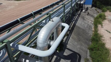 Wall Mural - Oil pipeline and gas pipeline stretched transfer during oil refinery and chemical industrial plant, Aerial view