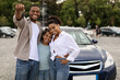 © Prostock-studio - Joyful Black Family Showing Car Key Standing Near Auto Outdoor
