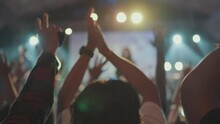 Crowd Hands Up At Evening Live Music Concert On Stage At Festival In Slow Motion