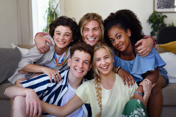 Wall Mural - Portrait of diverse group of friends with mixed races having fun together indoors, Friendship and lifestyle concepts