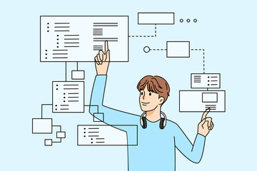 Male programmer working with tabs