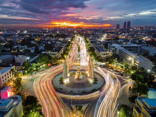aerial view of democracy monument with long exposure blurry car traffic at twilight sky in evening t
