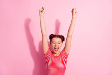 Photo Of Funky Lucky Woman Wear Cropped T-shirt Creaming Rising Fists Isolated Pink Color Background