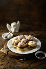 Canvas Print - Homemade profiteroles with chocolate paste