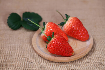 Poster - Fresh strawberries on the plate, fresh strawberries on the table