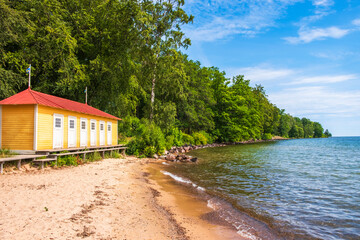 Poster - Old classic beach hut at a lake in the summer