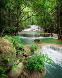 Fototapeta Łazienka - beautiful emerald waterfalls green forest mountains guiding for backpacker Thailand destinations backpacking camping relaxing hiking at Huai Mae Khamin waterfall national park, Kanchanaburi.