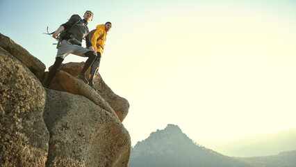 Wall Mural - climbers on mountaintop