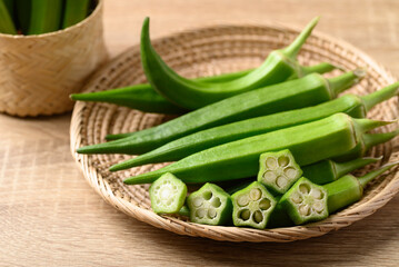 Wall Mural - Green okra or ladies fingers (Edible green seed pods), Organic vegetables from local farmer market