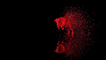 Red painted bull with red particles in dramatic contrasting light representing financial market trends under black-blue background. Concept 3D CG of stock market.