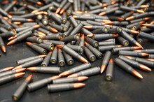 Scattered Service Cartridges On Table At Military Plant