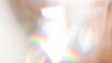 Wall Mural - Optical Game of Faces Inside a Diamond. Loop. The light passes through the facets of a slowly rotating diamond and creates repetitive sparkling highlights and rainbow colors