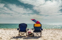 Sunset At White Sand Beach. Lounge Beach Chairs With Accessory In Naples Beach, Florida, USA. Vintage Processed. 