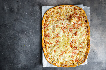 savory pie Flammkuchen bacon, onion, sour cream delicious pastries fresh meal food snack on the table copy space food background rustic 