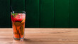 Fresh strawberry mojito drinks on a vintage wooden dark table. mocktail decorated with strawberries and mint