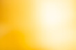 Abstract sunny bokeh blur golden shining background.