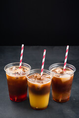 Poster - Various iced layered coffee drinks with orange juice and syrups