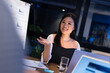 © Wavebreak Media - Smiling asian businesswoman gesturing and communicating while sitting at table in in meeting room